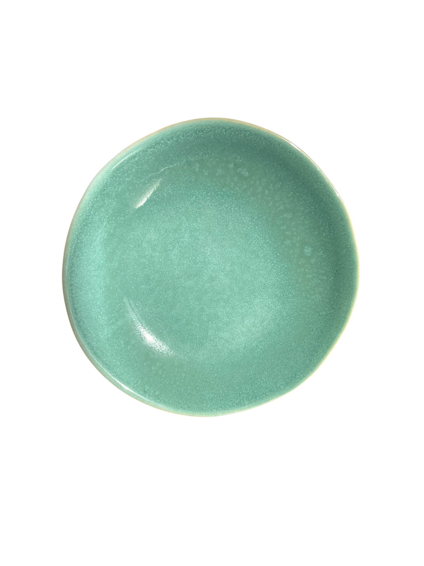 Petite assiette en grès faite à la main au Portugal, disponible en vert d’eau.